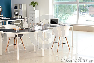 Stylish workplaces in modern office Stock Photo