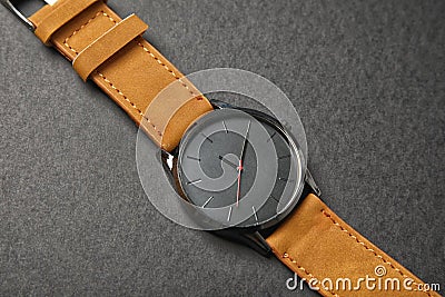 Stylish wrist watch on dark background. Stock Photo
