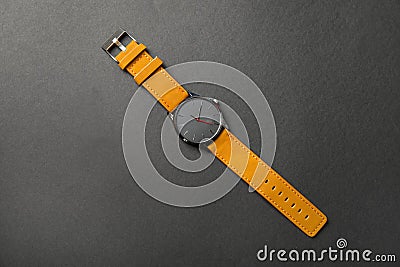 Stylish wrist watch on dark background, top view Stock Photo