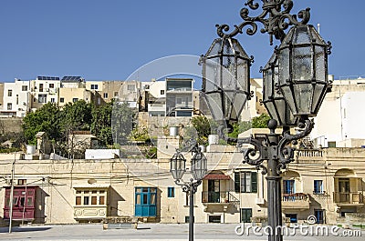 Stylish wrought iron street lamp with blue sky Stock Photo