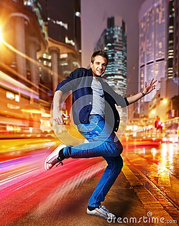 Stylish young dancer in a night city Stock Photo