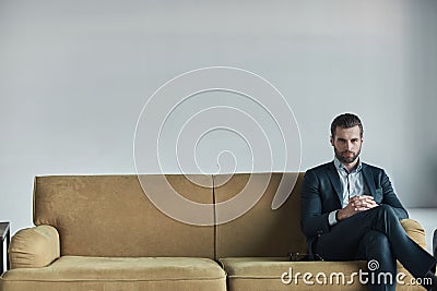 Stylish young man in a suit and bow tie. Business style. Fashionable image. Evening dress. man standing and looking Stock Photo