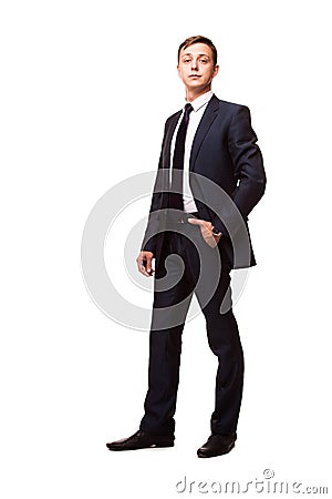 Stylish young man in suit and tie. Business style. Handsome man standing and looking at the camera Stock Photo