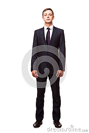Stylish young man in suit and tie. Business style. Handsome man standing and looking at the camera Stock Photo
