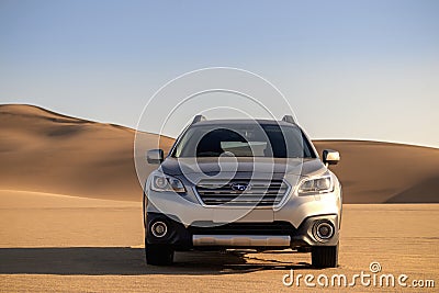 Subaru Outback standing in the middle of the desert. Namibia Editorial Stock Photo