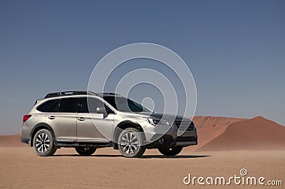 Subaru Outback standing in the middle of the Namib desert. Editorial Stock Photo