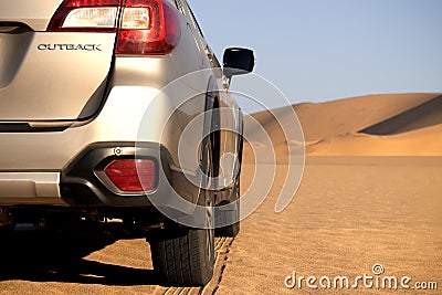 Subaru Outback standing in the middle of the Namib desert. Namibia. Africa Editorial Stock Photo