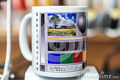 Sublimation mug designer production machine print pictures an coffee cup design Editorial Stock Photo