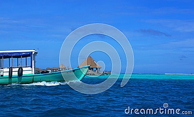 Submerged Atoll, Resort, Old Boat Editorial Stock Photo