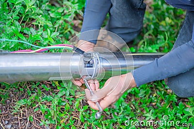 Repair groundwater pipes. Stock Photo