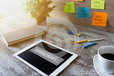 Subscribe button on device screen. Internet and digital marketing concept. Stock Photo