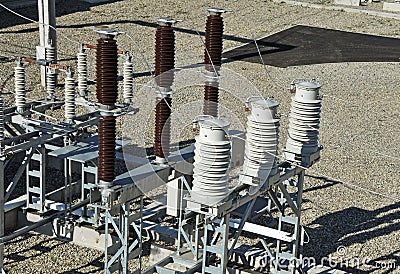 Substation with insulators,switches and disconnectors. Stock Photo