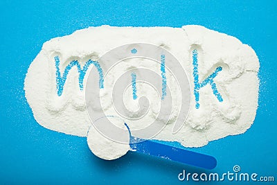 Substitution for breastfeeding, inscription of milk on a dry mix for feeding infants Stock Photo