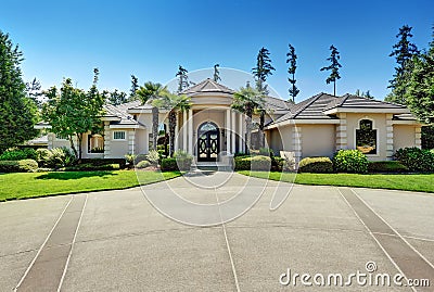 Suburban Luxury residential house with Perfect landscape design. Stock Photo