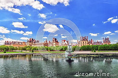 Suburban Residence of the France Kings - beautiful Chateau Fontainebleau with the fountain on foreground. Stock Photo