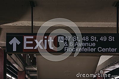 Subway exit sign to 47s,48s,49s street and Rockefeller Center frrom subway platform in New York, USA. Editorial Stock Photo