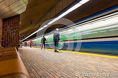Subway train arriving at Mont-Royal Station Editorial Stock Photo