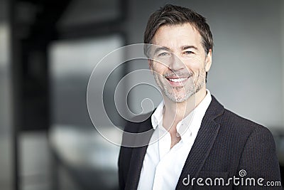 Succesful Mature Businessman Working At Home. Telecommuting. Stock Photo