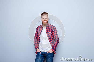 Success concept. Excited young stylish red bearded student in br Stock Photo