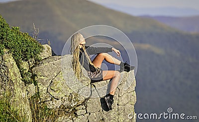 success concept. mountain traveling and hiking. rock climbing. mountaineering lover. reaching the top. woman relax on Stock Photo