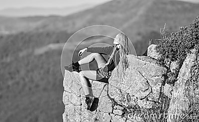 success concept. mountain traveling and hiking. rock climbing. mountaineering lover. reaching the top. woman relax on Stock Photo