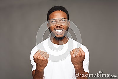 Success, excited black man with happy facial expression Stock Photo