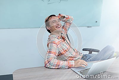 Success excited business man happy smile sitting Stock Photo