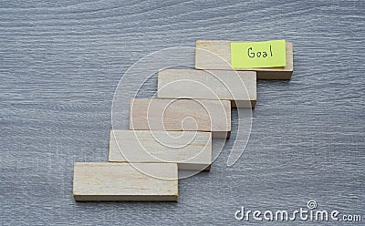 Success in people life concept - step by step to achieve the goals with wood background Stock Photo