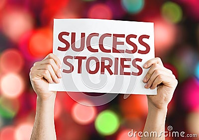 Success Stories card with colorful background with defocused lights Stock Photo