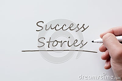 Success stories written on whiteboard Stock Photo