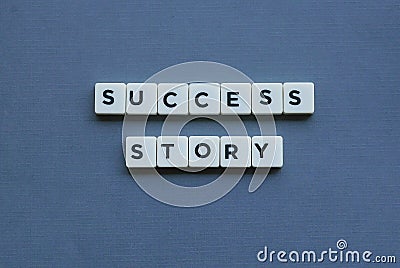 ' Success Story ' word made of square letter word on grey background Stock Photo