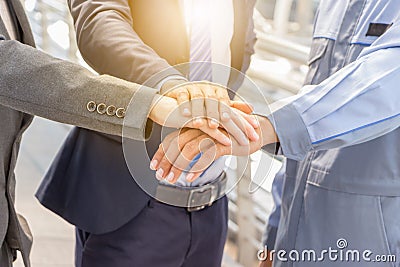 Success Teamwork concept, Business people joining hands city background. Stock Photo