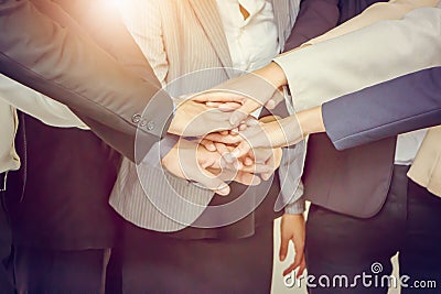 Success Teamwork Concept, Business people joining hands Stock Photo