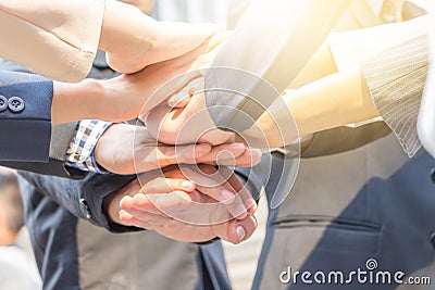 Success Teamwork Concept, Business people joining hands Stock Photo