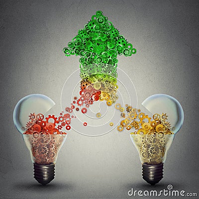 Success two glass light bulbs releasing gears in shape of upward arrow Stock Photo