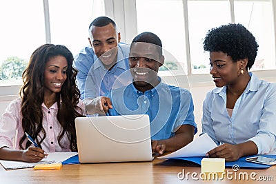 African american business team talking about strategy Stock Photo