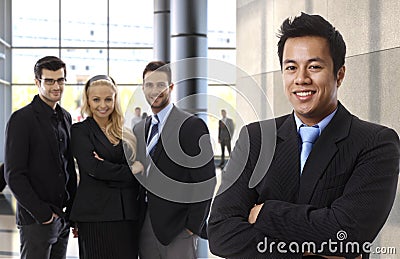 Successful asian businessman leading business team Stock Photo