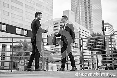 successful business leader boss men hold briefcase. successful business leader boss in suit. Stock Photo