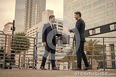 successful business leader boss men hold briefcase. successful business leader boss in suit. Stock Photo