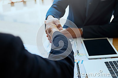 Successful business peolple handshaking after good deal. Stock Photo