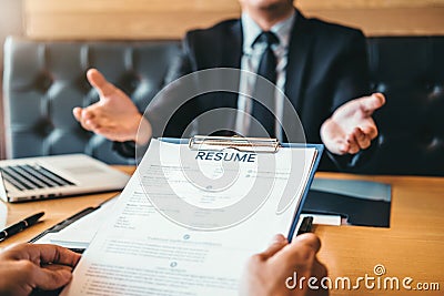 Successful business Senior manager during a job interview with e Stock Photo