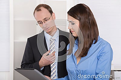Successful business team - good teamwork under man and woman. Stock Photo
