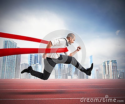 Successful businessman on the finishing line Stock Photo