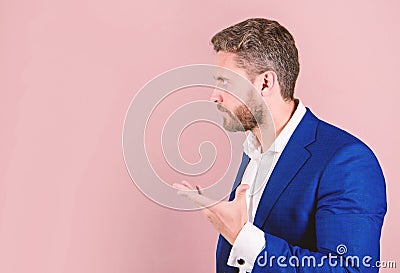 Successful businessman motivational inspiring speech pink background copy space. Businessman motivating colleagues. Man Stock Photo