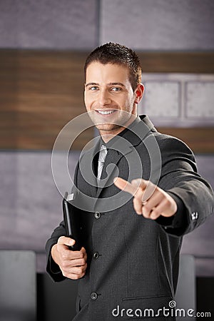 Successful businessman smiling happily Stock Photo