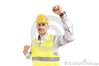 Successful engineer architect or builder acting happy and cheerful. Stock Photo