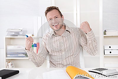 Successful manager sitting at office - positive. Stock Photo