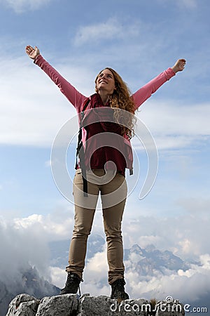 Successful mountaineer on top of a mountain Stock Photo