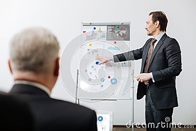 Successful office manager representing the project in the office Stock Photo
