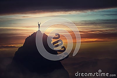 Successful person celebrates on the top of 2023 year mountain peak. Conceptual and motivational scene inspiring for overcoming Stock Photo